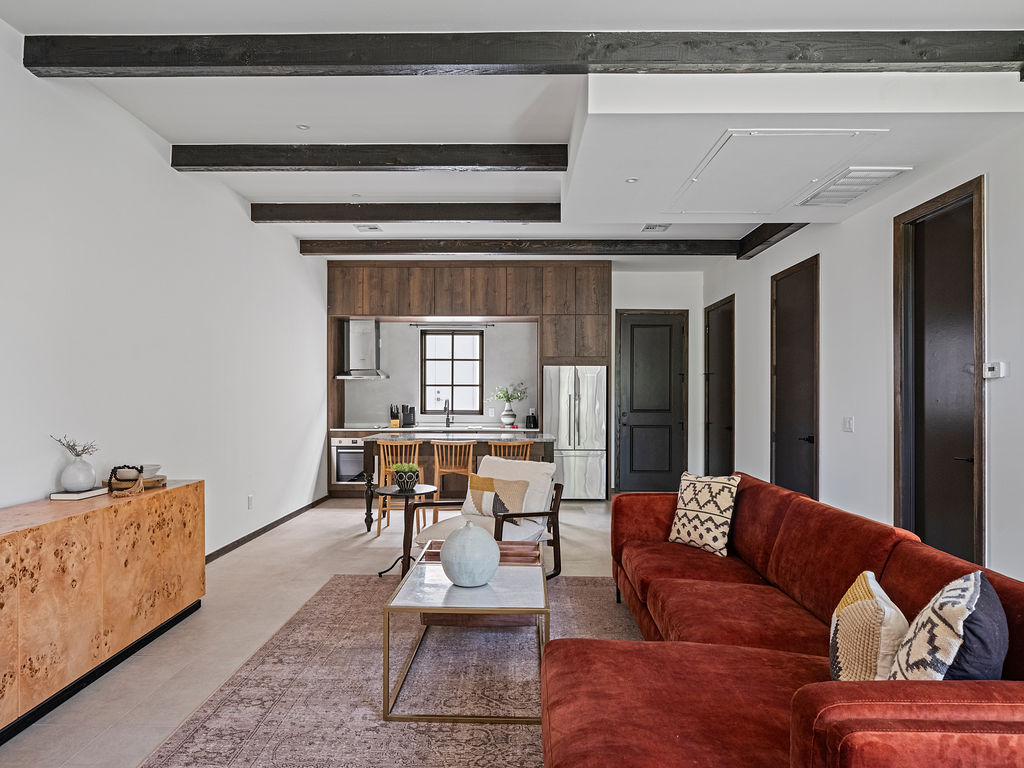 a living room filled with furniture and a couch